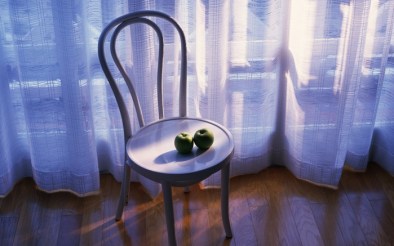 82873390_Two_Apples_On_A_Chair_By_The_Window